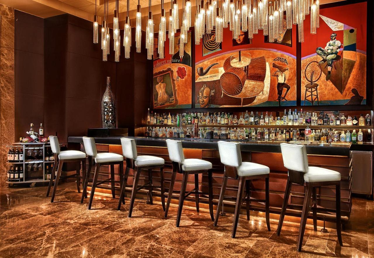 Crimson Hotel Filinvest City, Manila Muntinlupa City Екстериор снимка The bar at the lobby